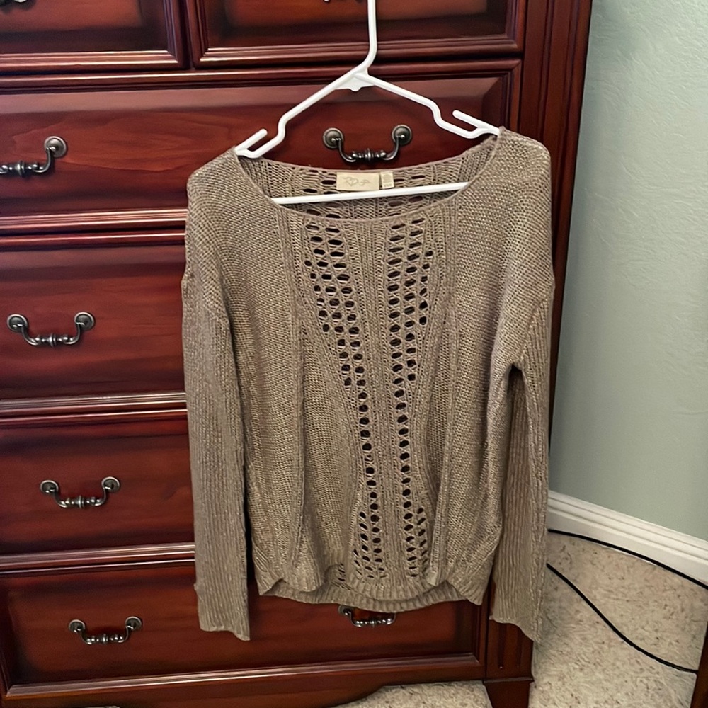 Cute women’s holey sweater
